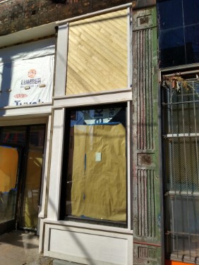 angled beadboard above right window